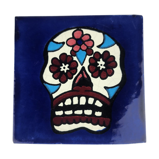 Floral sugar skull Mexican ceramic tile with royal blue background and colorful flowers