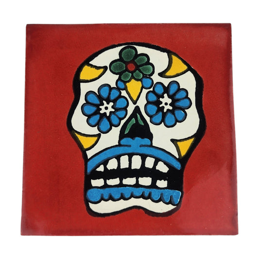 Floral sugar skull Mexican ceramic tile with red background and colorful flowers