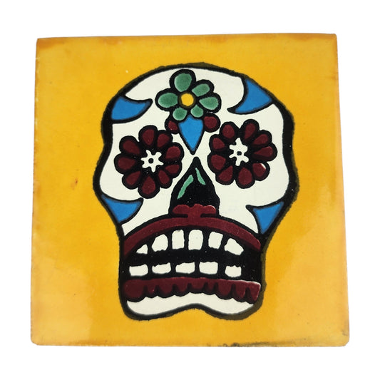 Floral sugar skull Mexican ceramic tile with mustard yellow background and colorful flowers