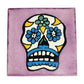 Floral sugar skull Mexican ceramic tile with purple background and colorful flowers