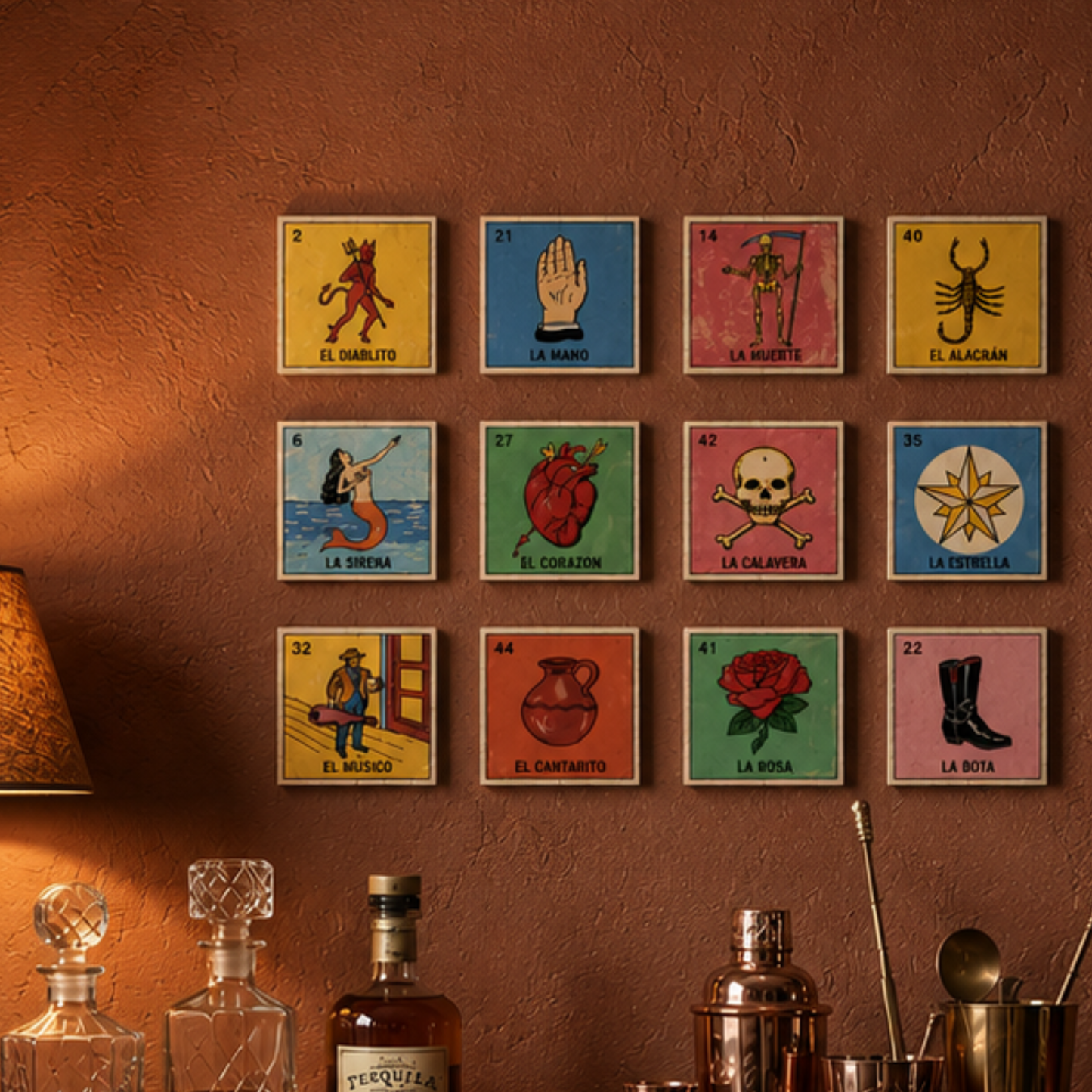 12-piece Love & Death Collection Lotería ceramic tile wall display arranged above a bar-inspired décor setting.
