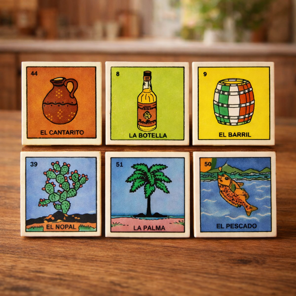 Six Mexican Lotería ceramic tiles displayed as kitchen décor on a wooden table.