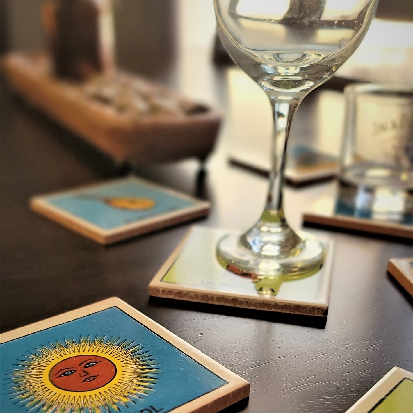 Coasters with artistic designs on a wooden table