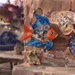 Blue Talavera-style ceramic fish wall décor displayed on a stucco wall in a Mexican-inspired outdoor space.