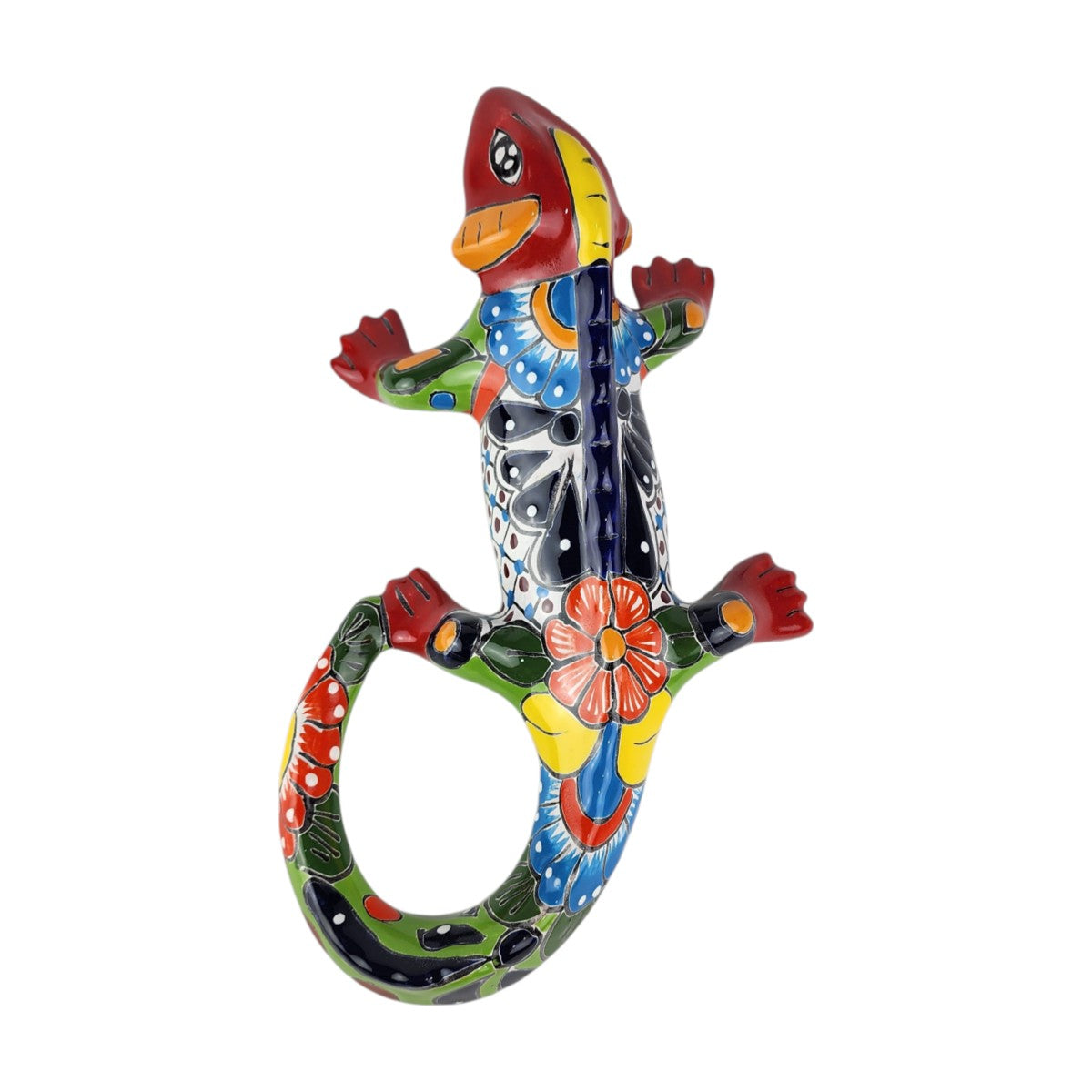Red Talavera-style ceramic iguana with green, blue, yellow, and white patterns displayed on a white background.