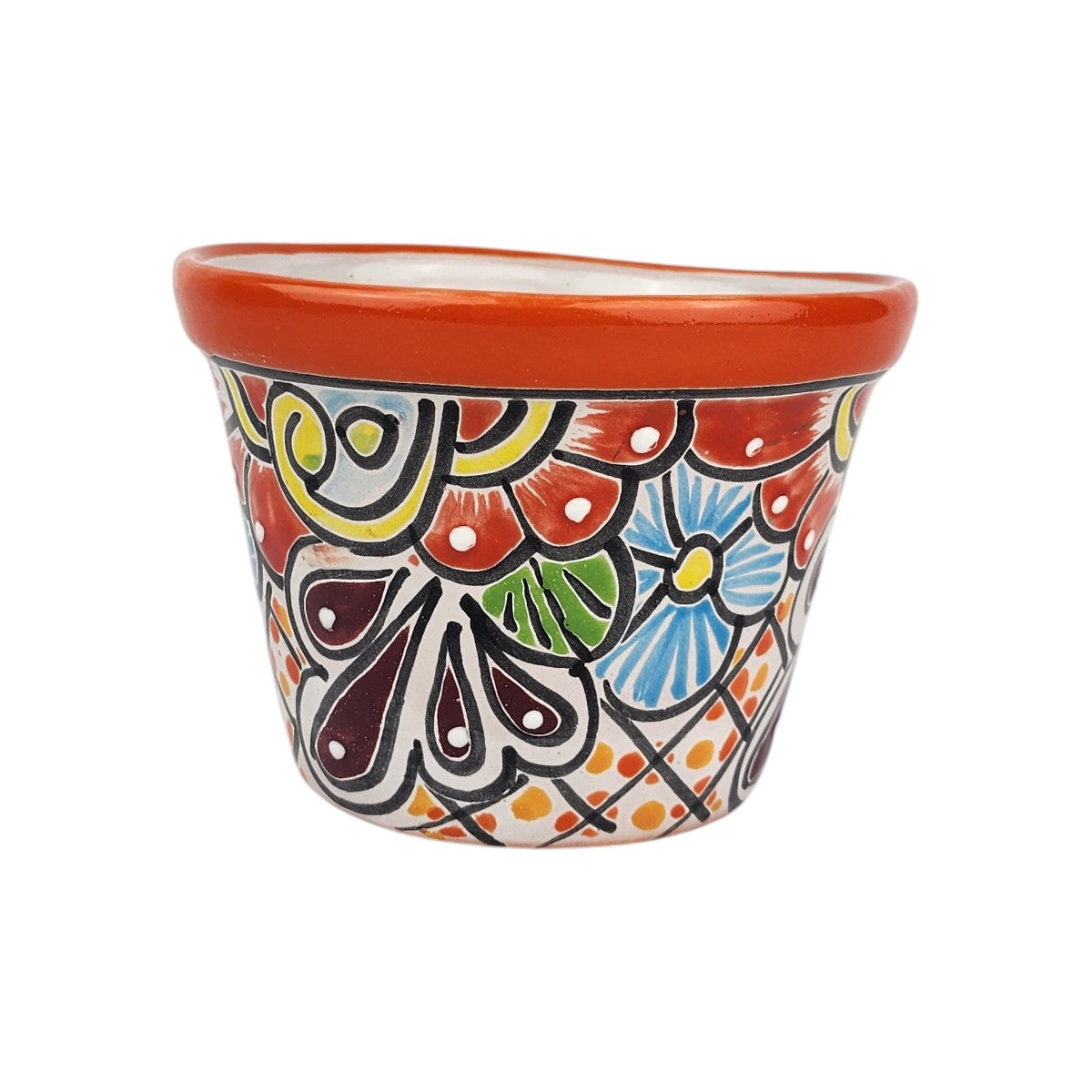 Red orange rim ceramic planter with blue and orange flowers, burgundy teardrop motifs, green leaves, and a dotted lattice pattern on a white background.