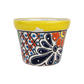 Yellow rim Talavera-style ceramic planter with deep blue floral and colorful lattice artwork