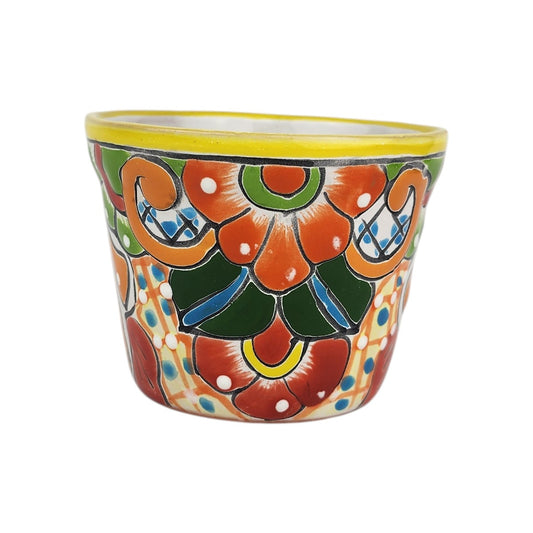 Yellow rim Talavera-style ceramic planter with orange green and blue floral artwork