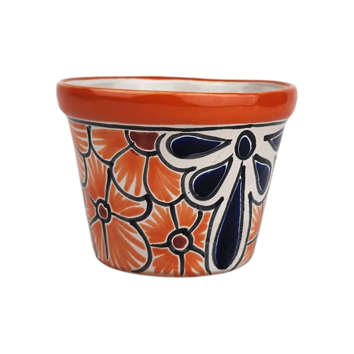 Red orange rim ceramic planter with orange flowers, burgundy centers, and a deep blue floral motif outlined in black on a white background.