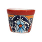 Red rim Talavera-style ceramic planter with blue and orange floral artwork, hand-painted in Mexico