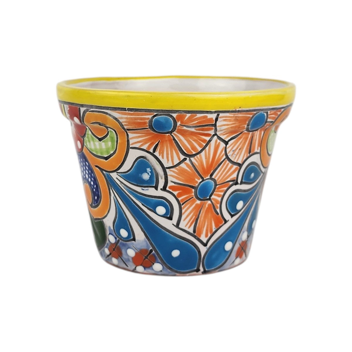 Yellow rim ceramic planter with orange flowers, blue centers, sweeping blue teardrop motifs, and green accents on a white background.
